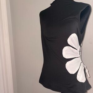 Black Sleeveless Top with White Floral Accent